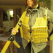 You posing with a "spaghetti gun" and wearing a woven "spaghetti-hunting jacket". Spaghetti may be cooked or uncooked.